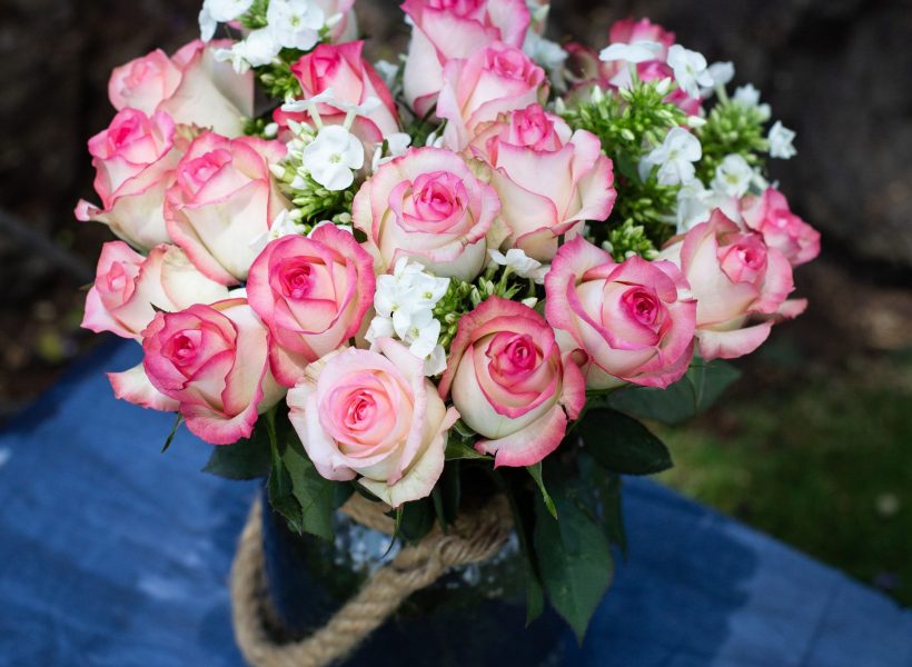 A pot with an arrangement of flowers, Baraka Roses Ngorika.